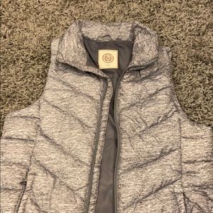 zip up grey vest